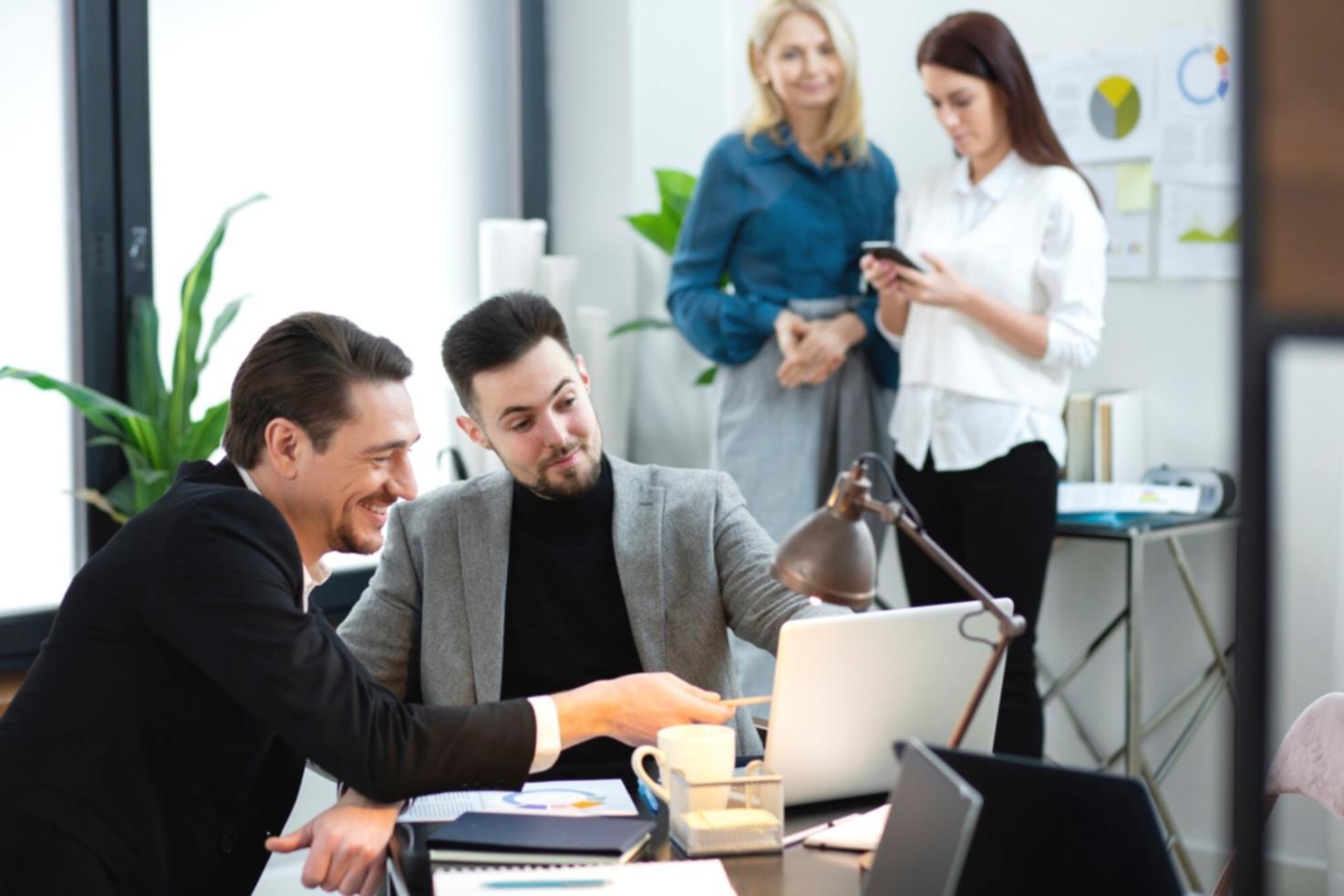 Finance professional reviewing automated budget tracking system interface